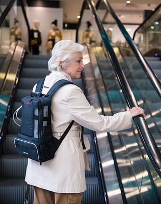 ZenOlite_Patient_shopping_going_up_escalators